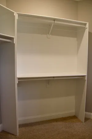 a bathroom with a shower and a sink