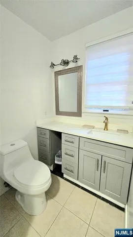 a view of a two chairs on the deck