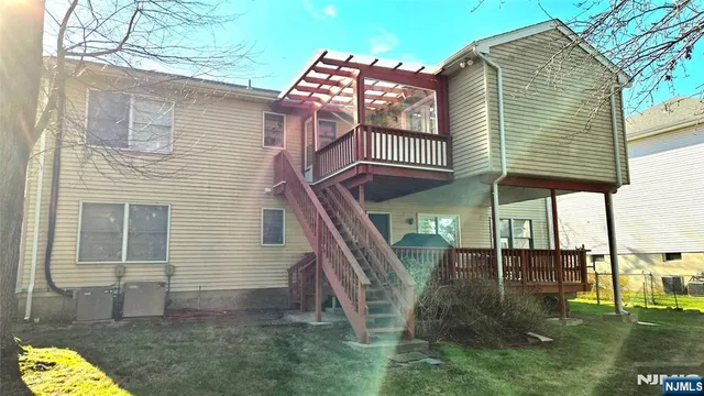 a view of a house with basketball court