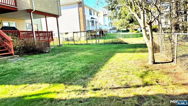 a view of swimming pool with an outdoor space and seating area