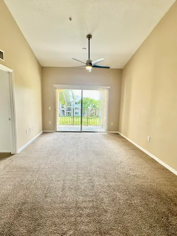 a view of livingroom with an entryway and window