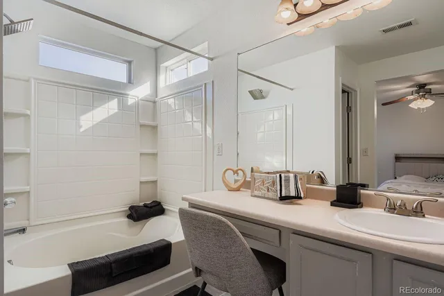 a kitchen with a sink and a refrigerator