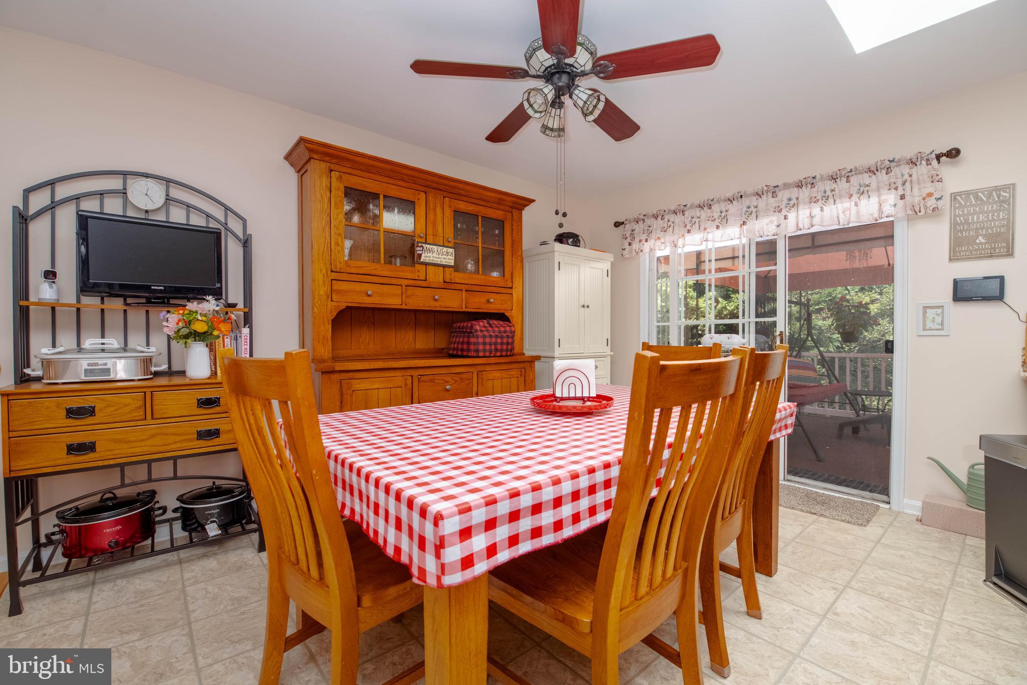 1705 Church Point Court Aberdeen, MD 21001 - Photo 16 of 86 a view of a dining room with furniture window and outside view