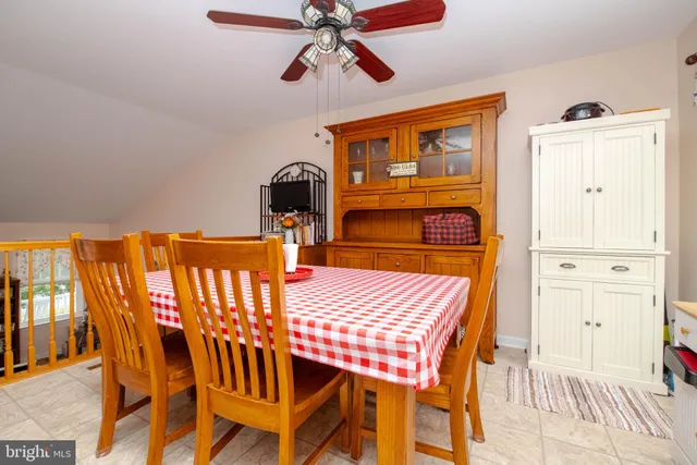 a bedroom with a bed and furniture