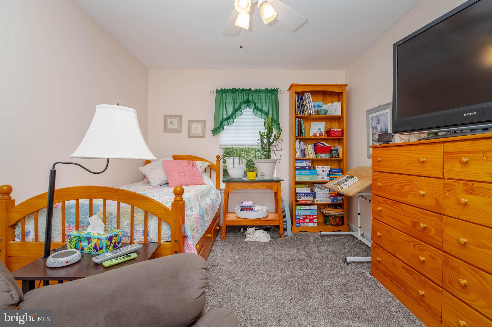 1705 Church Point Court Aberdeen, MD 21001 - Photo 27 of 86 a bedroom with a bed and a flat tv screen on dresser