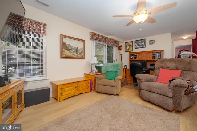 a view of balcony and floor to ceiling window