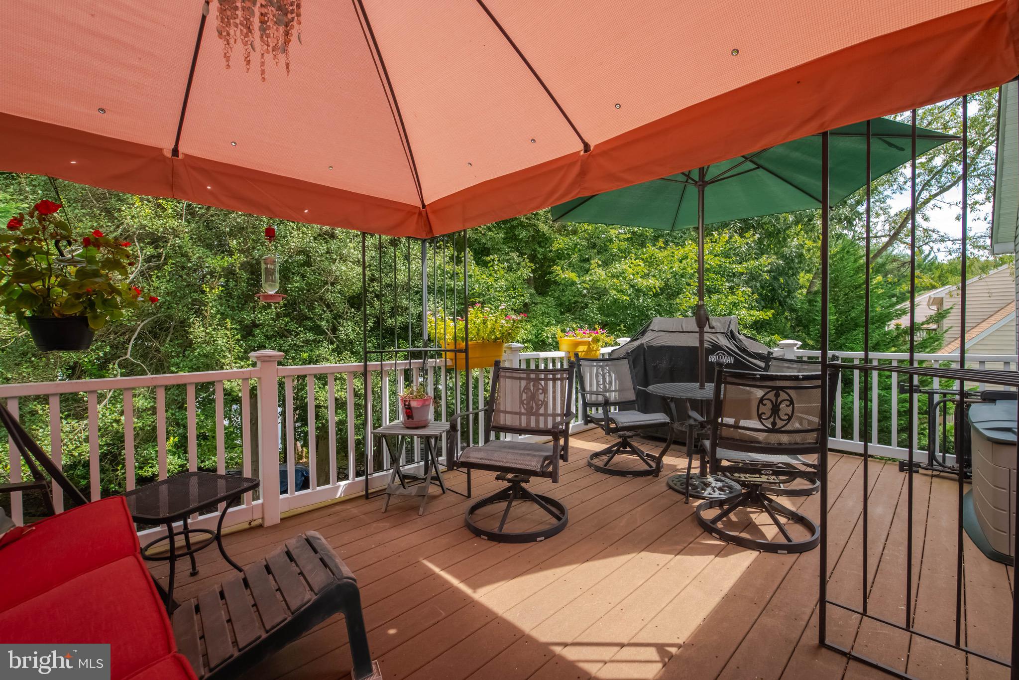 1705 Church Point Court Aberdeen, MD 21001 - Photo 38 of 86 a view of a patio with table and chairs under an umbrella