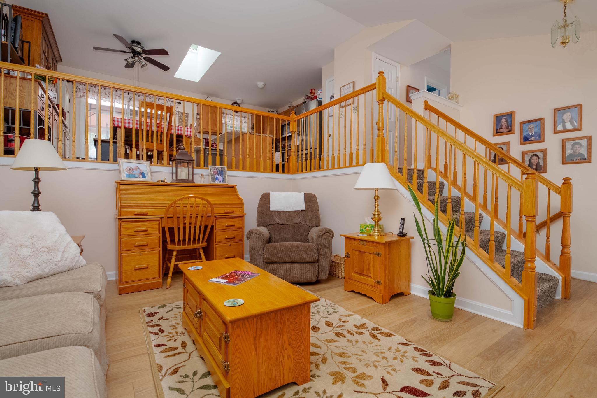 1705 Church Point Court Aberdeen, MD 21001 - Photo 7 of 86 a living room with patio furniture and a wooden floor