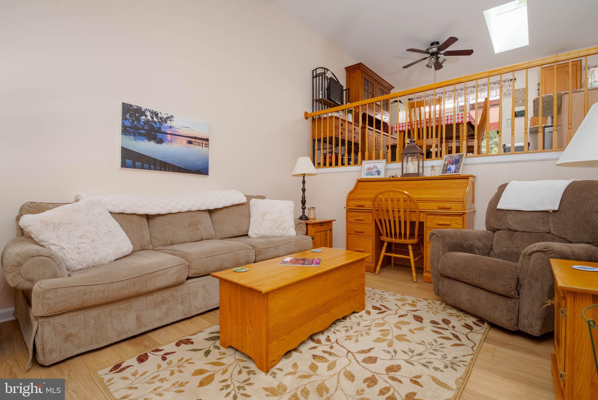 1705 Church Point Court Aberdeen, MD 21001 - Photo 8 of 86 a living room with furniture a rug and white walls