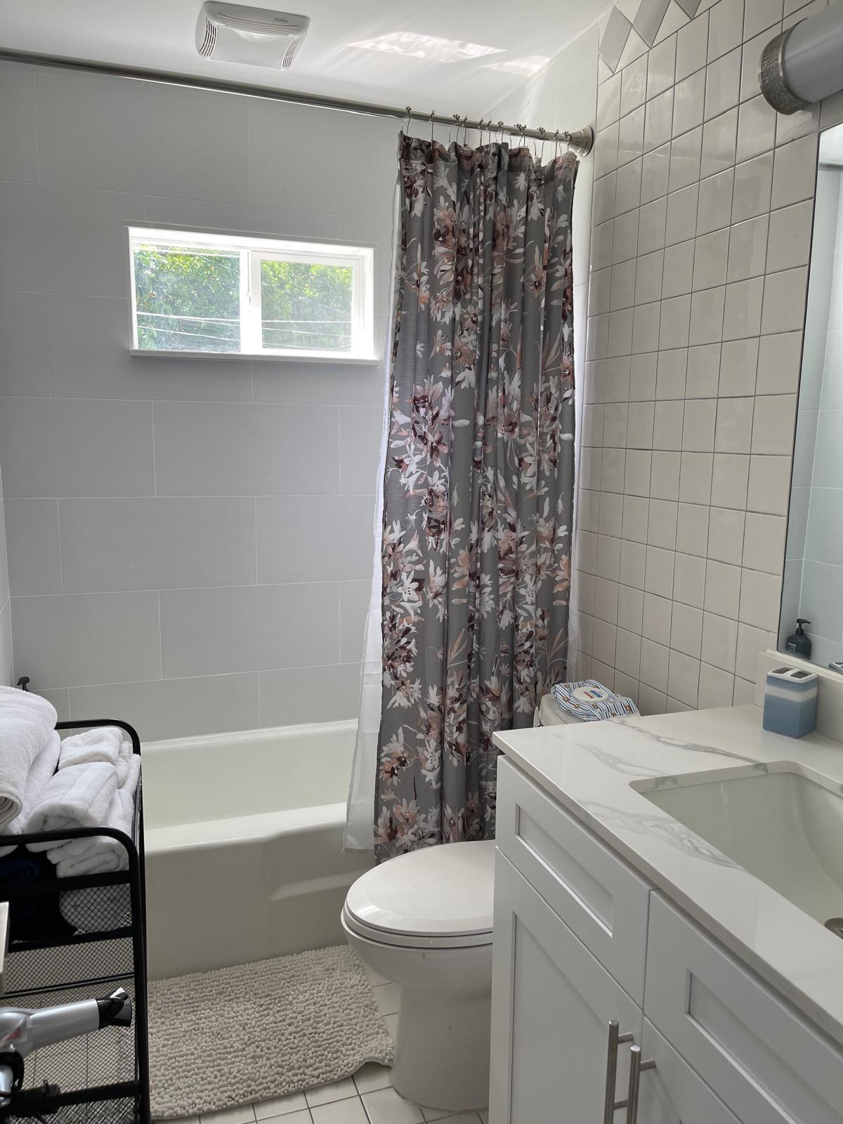 2776 Seminole Road Palm Springs, FL 33406 - Photo 18 of 24 a bathroom with a sink toilet and shower