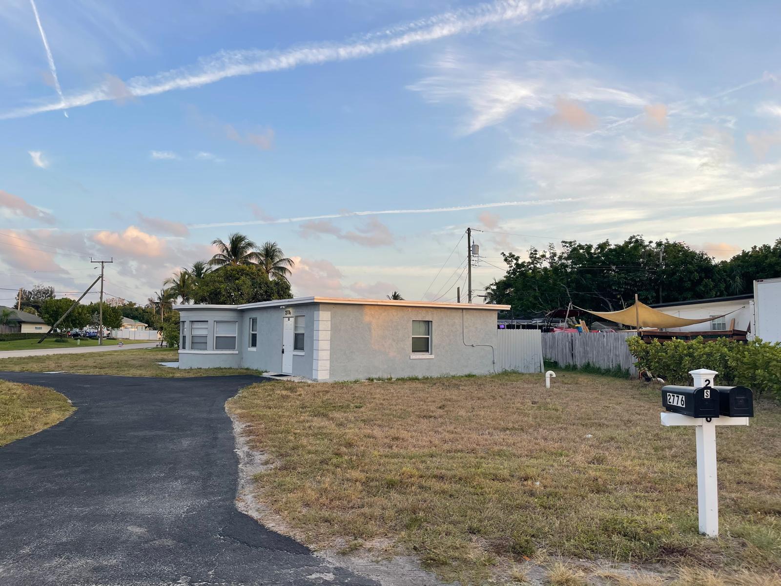 2776 Seminole Road Palm Springs, FL 33406 - Photo 4 of 24 a view of a terrace