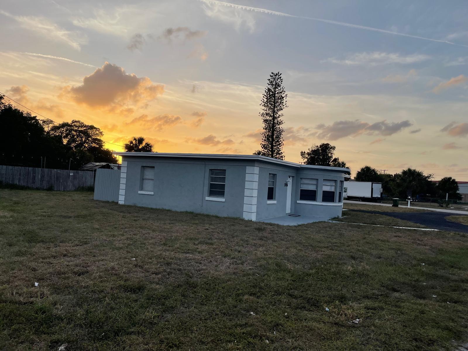 2776 Seminole Road Palm Springs, FL 33406 - Photo 5 of 24 a view of a house with a yard