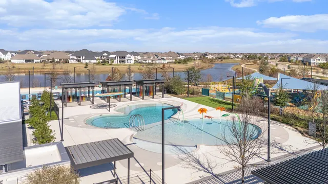 an aerial view of a house with outdoor space