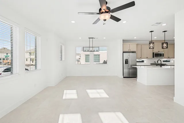 an aerial view of a swimming pool and outdoor space