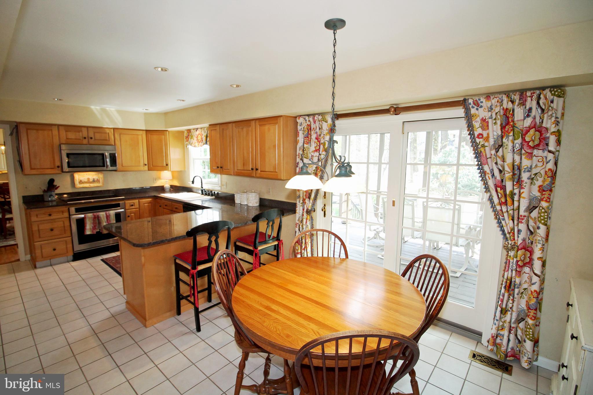 1003 Valewood Road Towson, MD 21286 - Photo 19 of 53 Kitchen - sliding doors to screened porch
