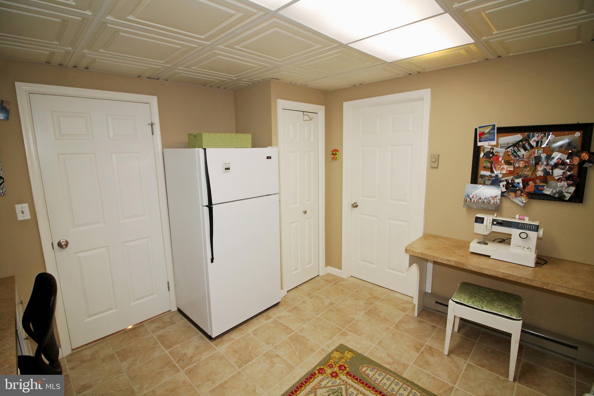 1003 Valewood Road Towson, MD 21286 - Photo 41 of 53 Craft room - extra refrigerator, ceramic floor