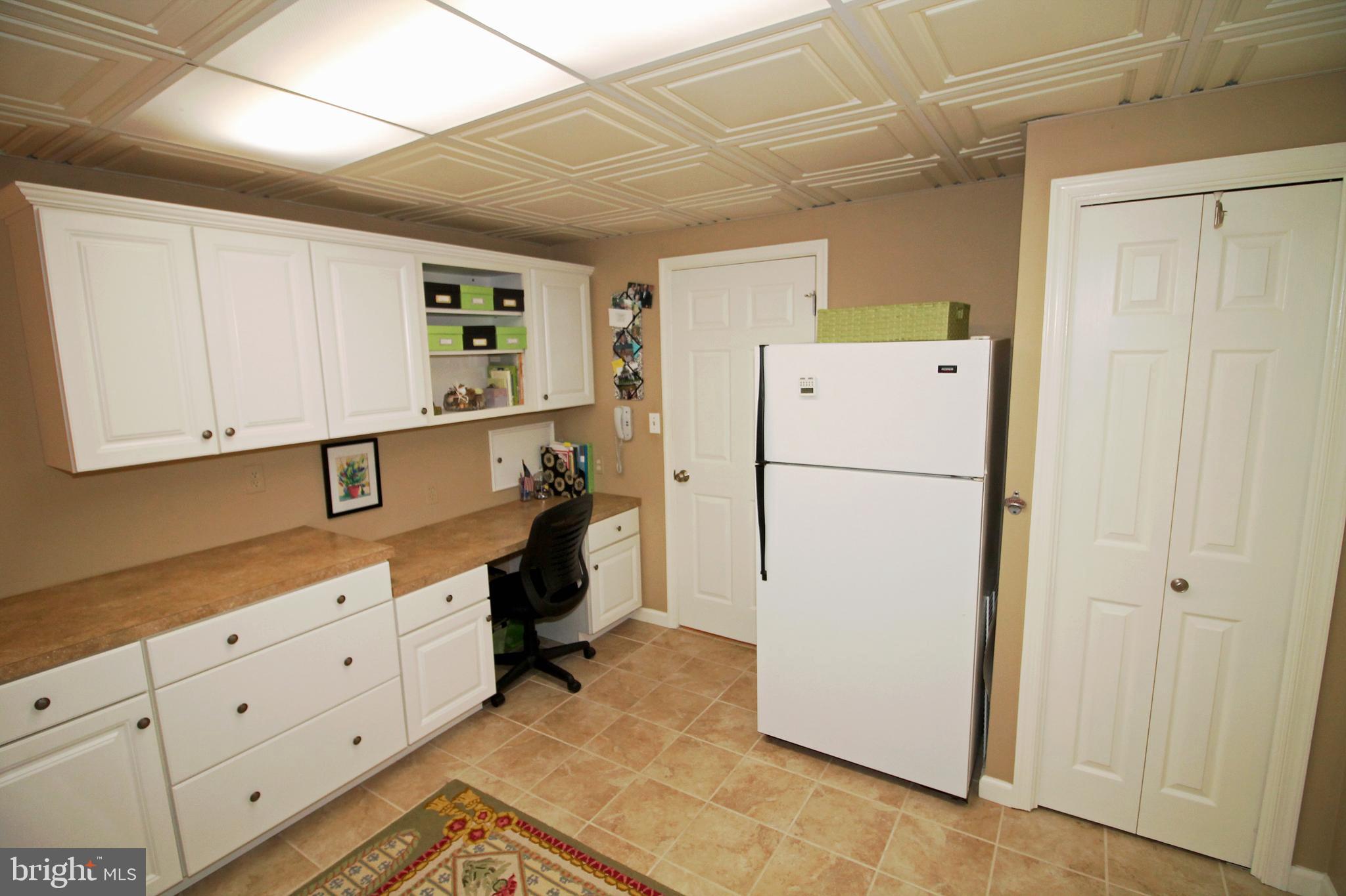 1003 Valewood Road Towson, MD 21286 - Photo 42 of 53 Craft room - work surface and desk