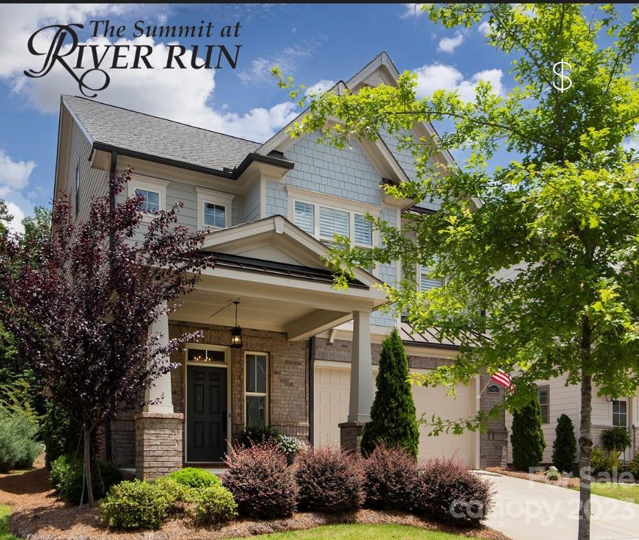 15111 Rocky Bluff Loop Davidson, NC 28036 - Photo 1 of 24 a front view of a house with garden