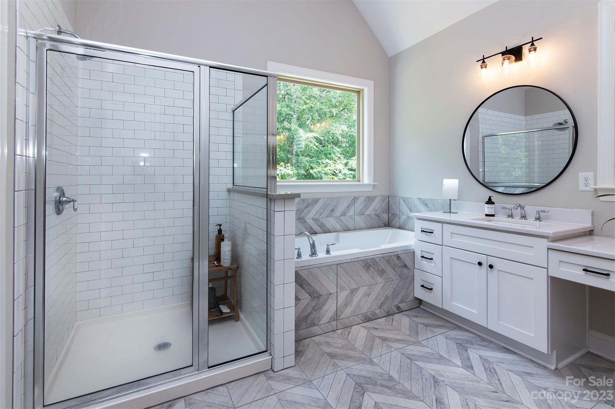 15111 Rocky Bluff Loop Davidson, NC 28036 - Photo 14 of 24 a bathroom with a double vanity sink and a mirror