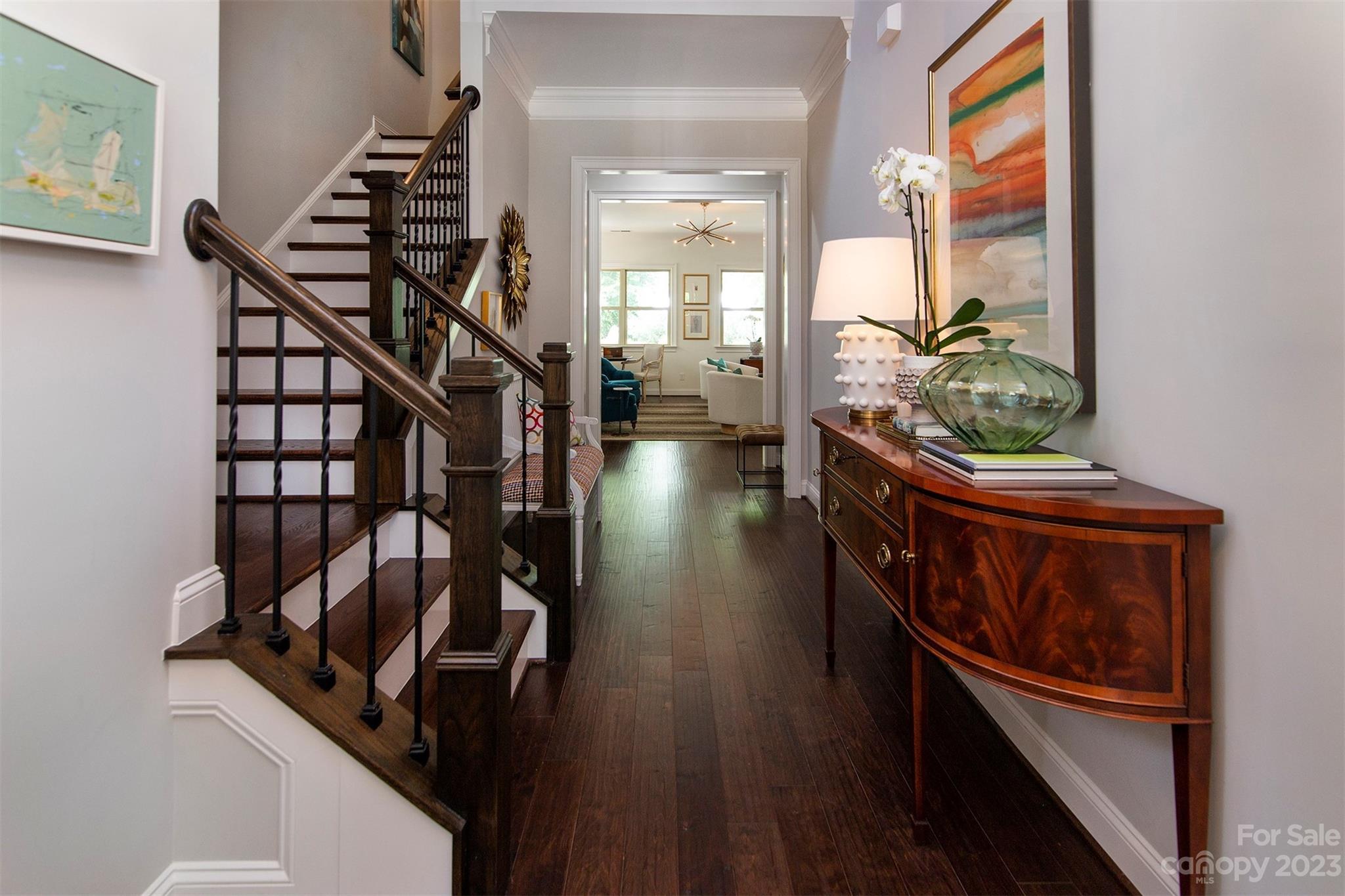 15111 Rocky Bluff Loop Davidson, NC 28036 - Photo 2 of 24 a view of entryway and hall with wooden floor