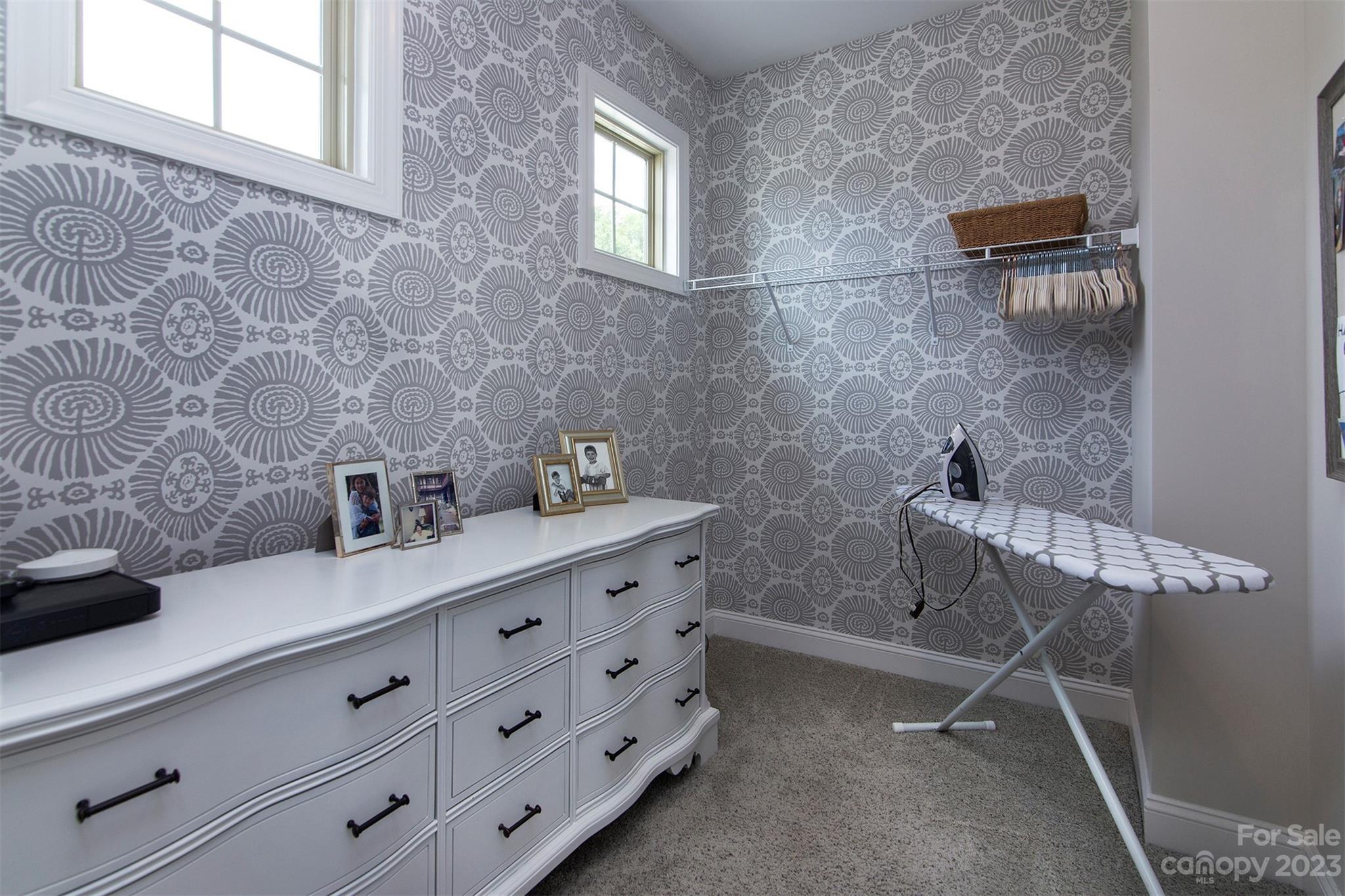 15111 Rocky Bluff Loop Davidson, NC 28036 - Photo 21 of 24 a bathroom with a granite countertop sink a mirror and shower