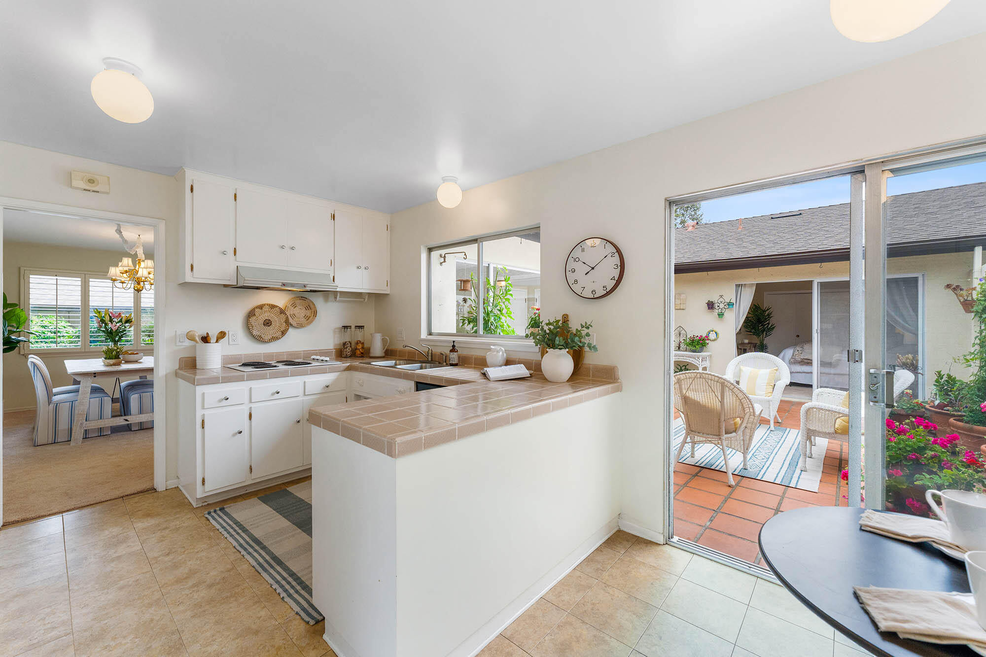 875 Cieneguitas Road Santa Barbara, CA 93110 - Photo 6 of 39 Kitchen and patio - 875 Cieneguitas Rd