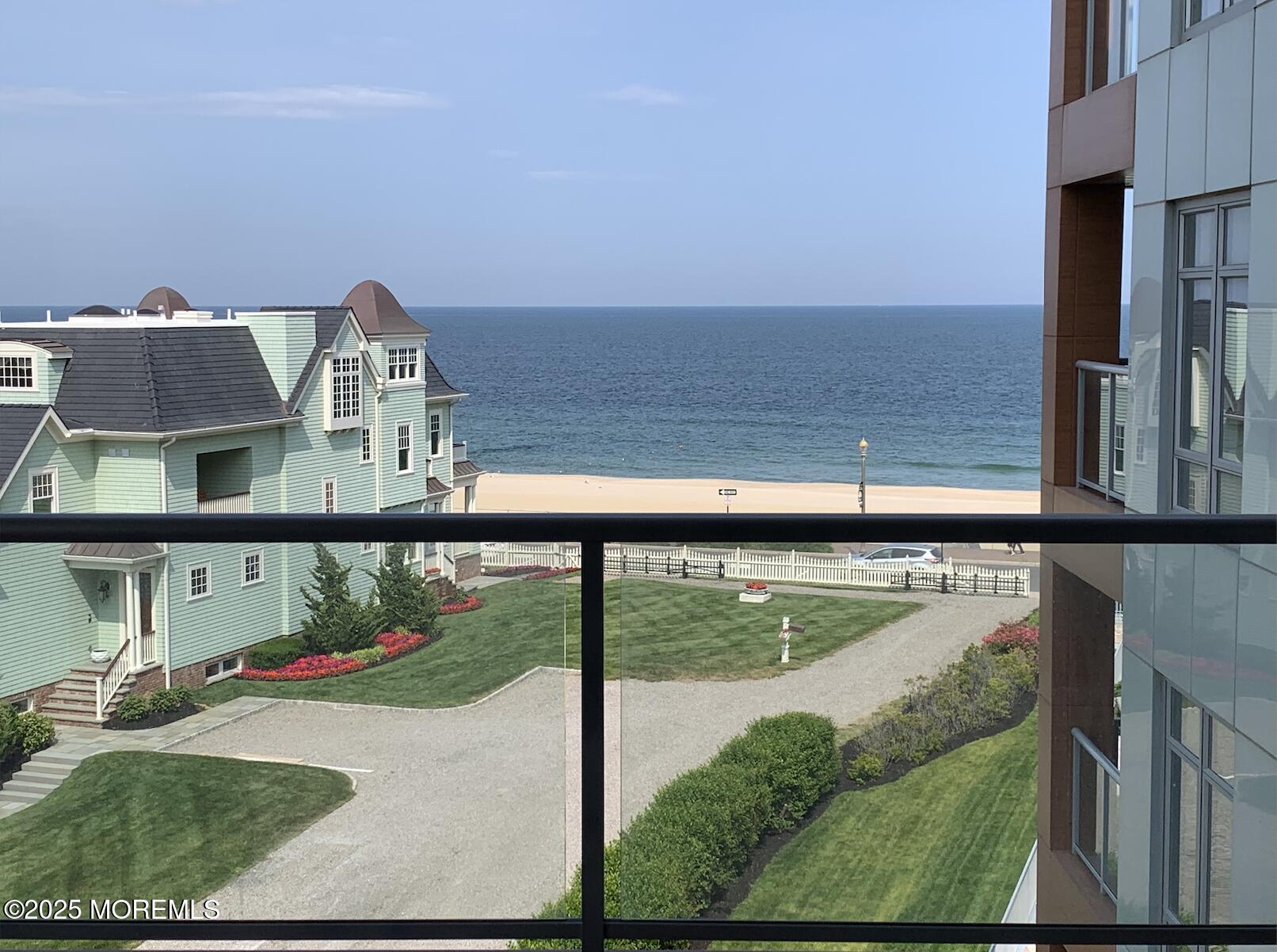 345 Ocean Boulevard, Unit 402 Long Branch, NJ 07740 - Photo 2 of 9 a view of swimming pool from a balcony