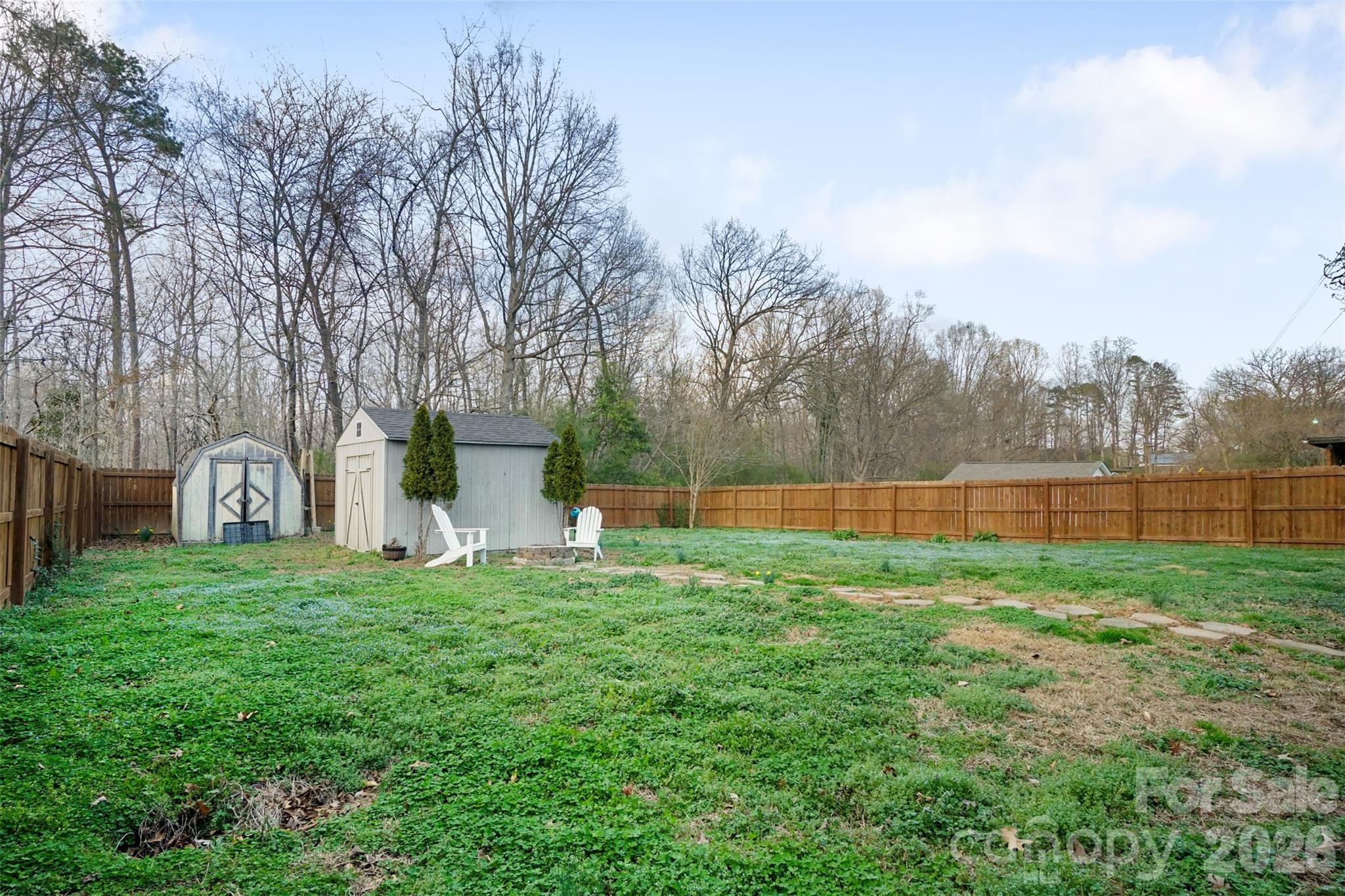 409 Blacksnake Road Stanley, NC 28164 - Photo 27 of 28 a view of a backyard