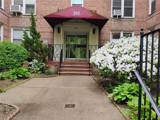 a front view of a house with a porch