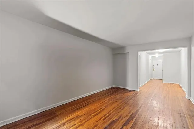 a view of small space with wooden floor