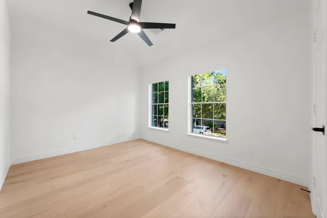 a view of a backyard with a small cabin