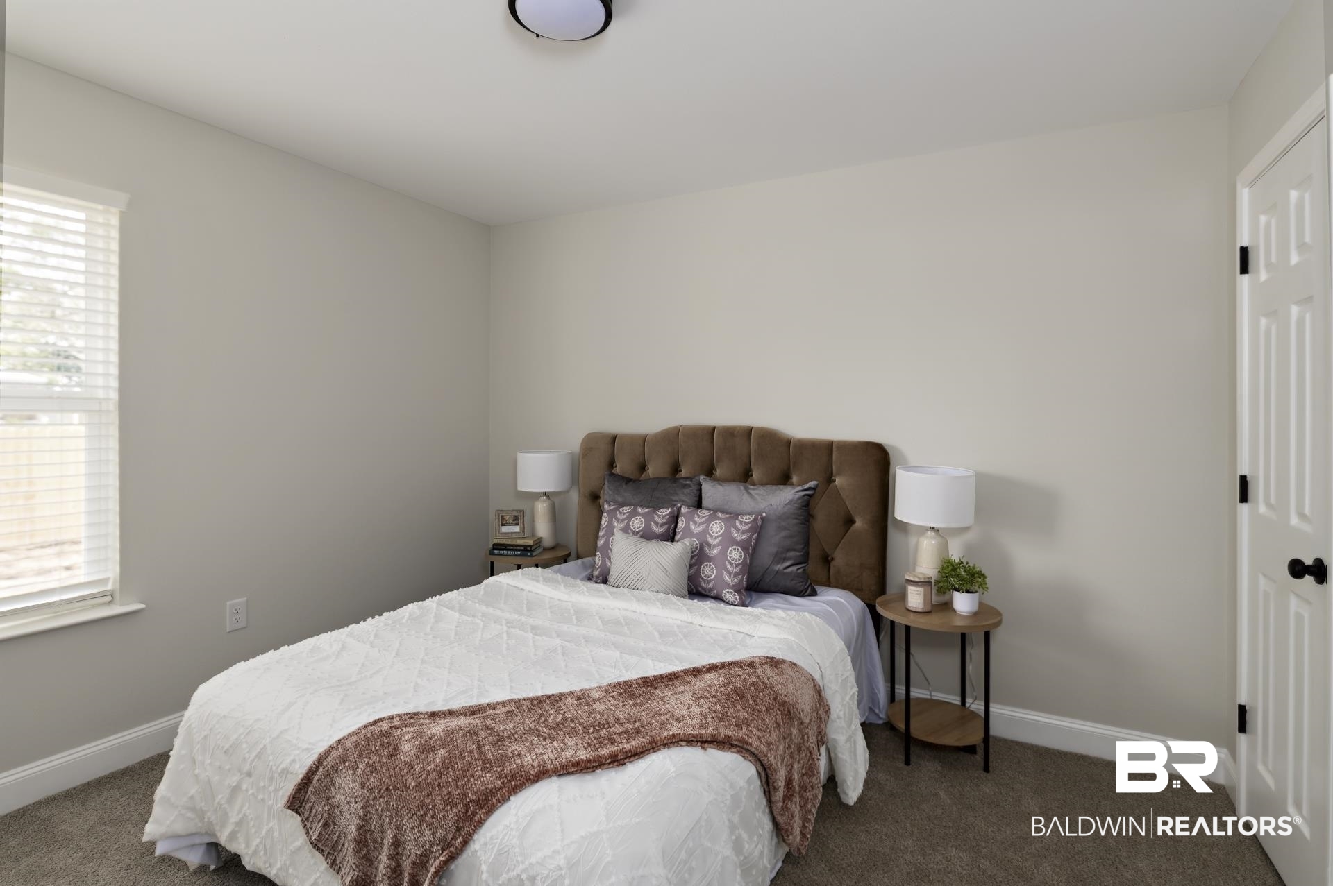 21717 Shadowbrook Street Robertsdale, AL 36567 - Photo 12 of 32 Carpeted bedroom featuring multiple windows and baseboards
