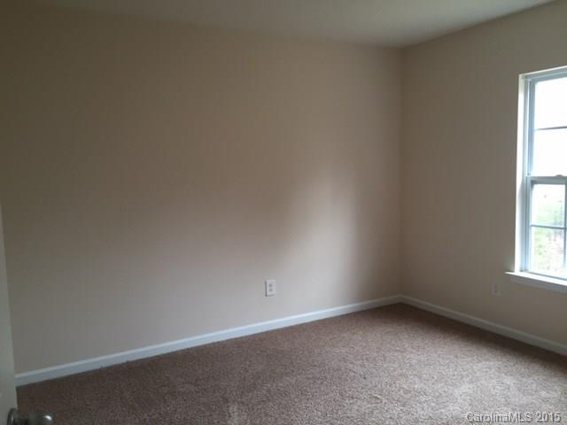 7800 Rabbits Foot Lane Charlotte, NC 28217 - Photo 4 of 9 an empty room with a window