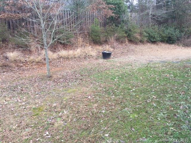 7800 Rabbits Foot Lane Charlotte, NC 28217 - Photo 8 of 9 a view of a dry yard with trees