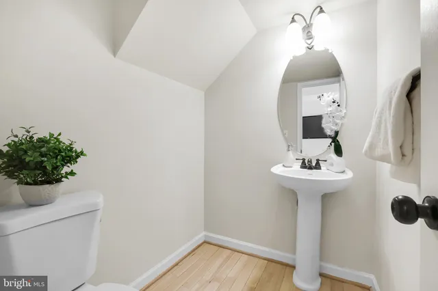a bathroom with a sink and mirror