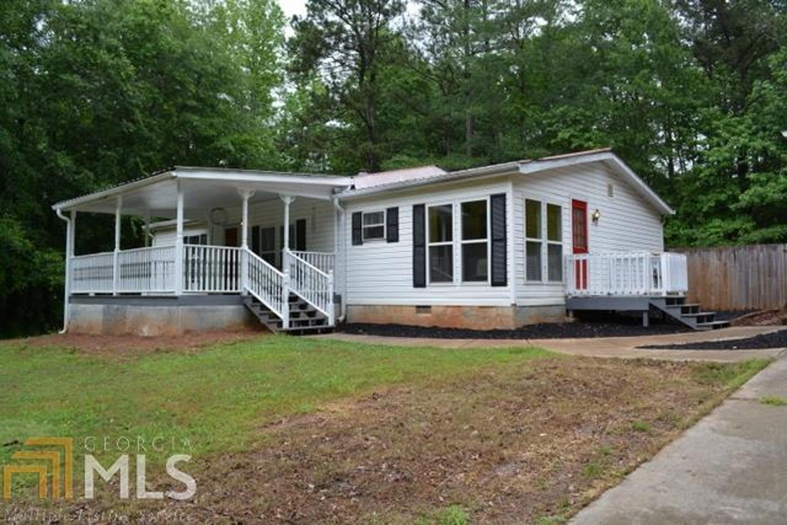 101 Doe Run Road Jackson, GA 30233 - Photo 1 of 1 a view of a house with a yard