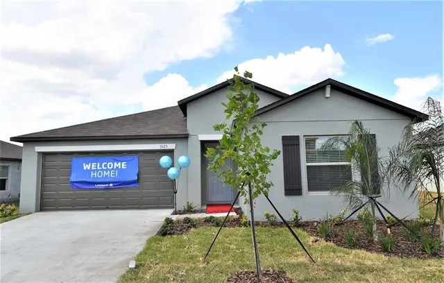 a front view of house with yard