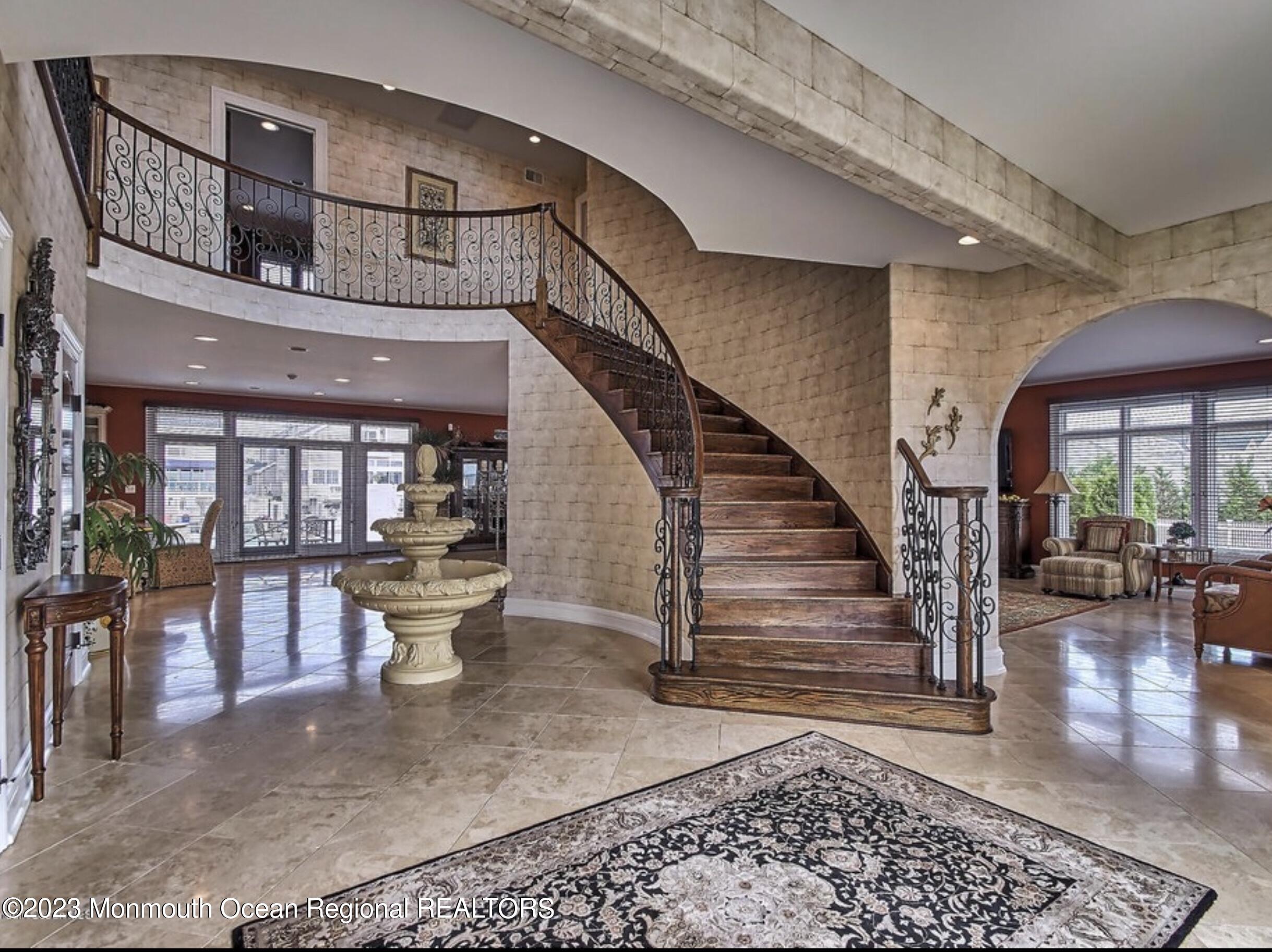 220 Pointe Drive Mantoloking, NJ 08738 - Photo 12 of 30 a view of entryway and hall with wooden floor