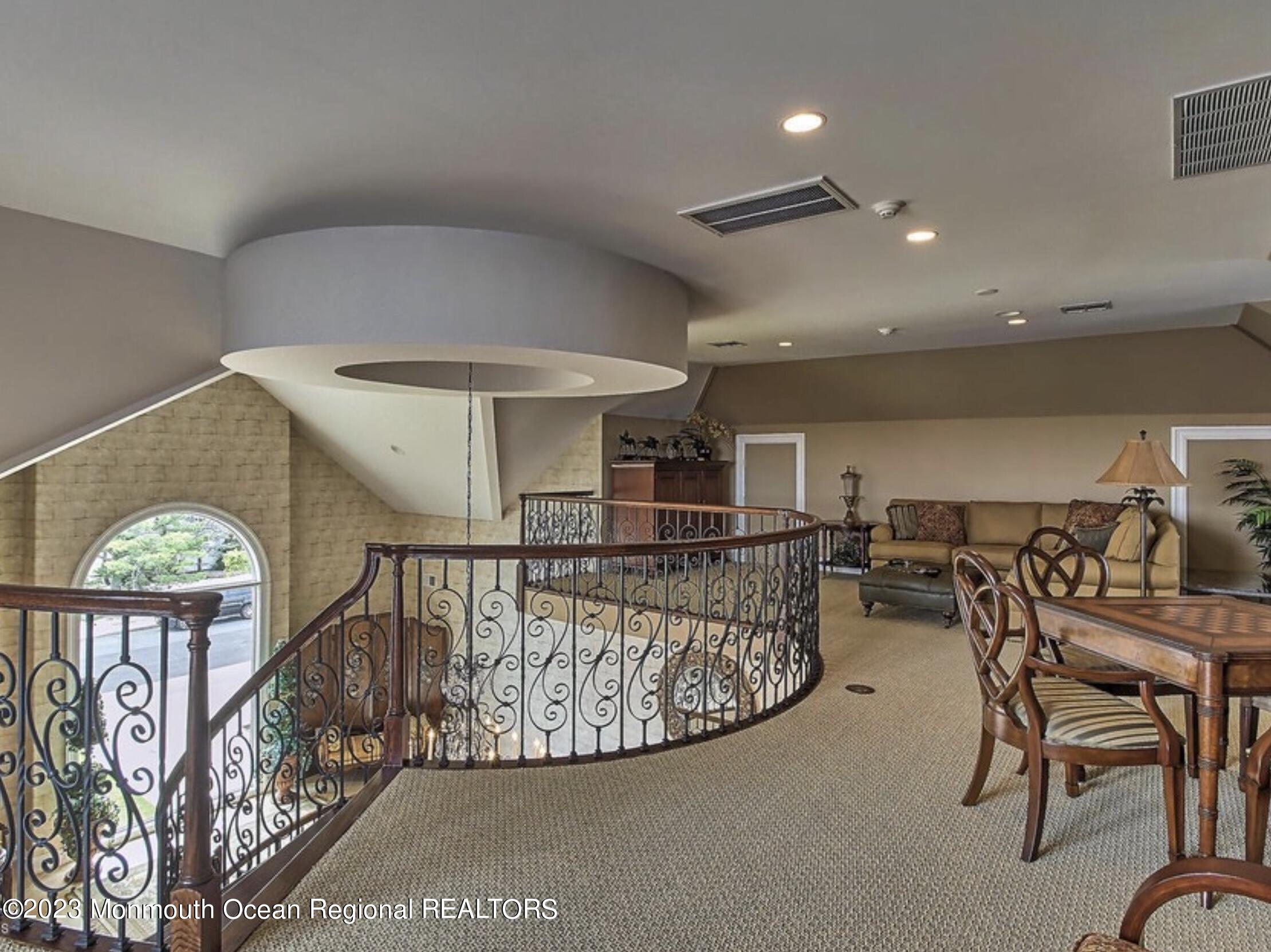 220 Pointe Drive Mantoloking, NJ 08738 - Photo 26 of 30 a view of entryway wih livingroom and furniture