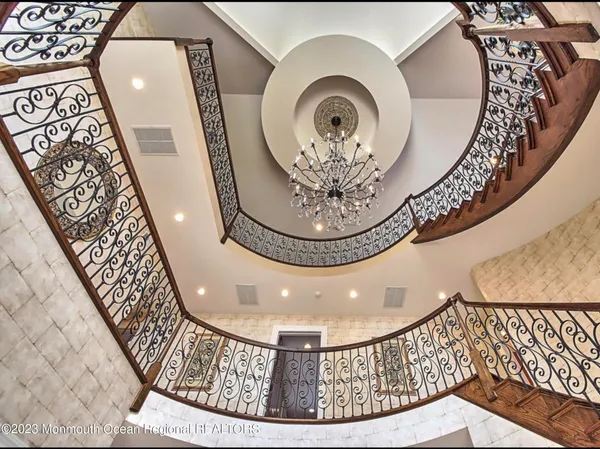 a view of swimming pool with outdoor seating