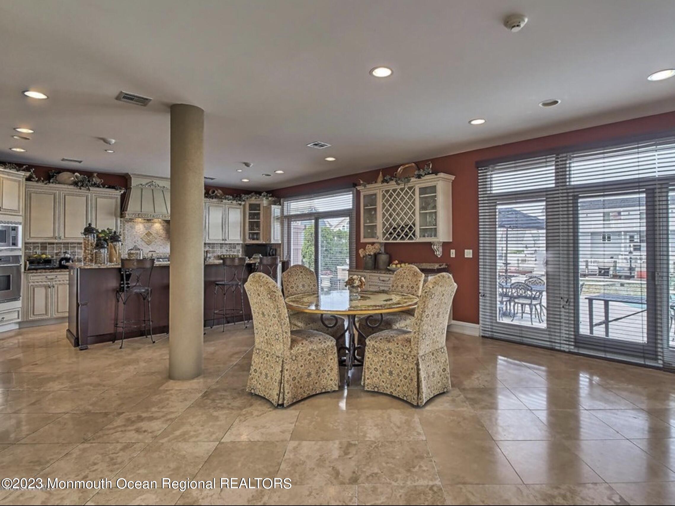 220 Pointe Drive Mantoloking, NJ 08738 - Photo 8 of 30 a living room with furniture and a large window
