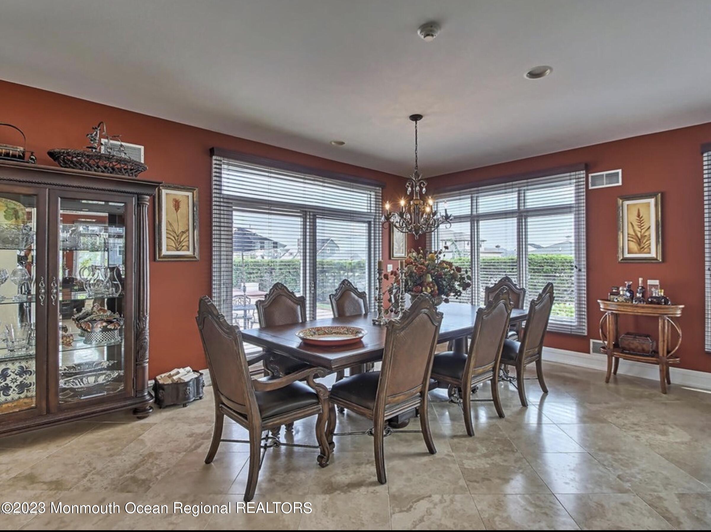 220 Pointe Drive Mantoloking, NJ 08738 - Photo 9 of 30 a view of a dining room with furniture window and outside view