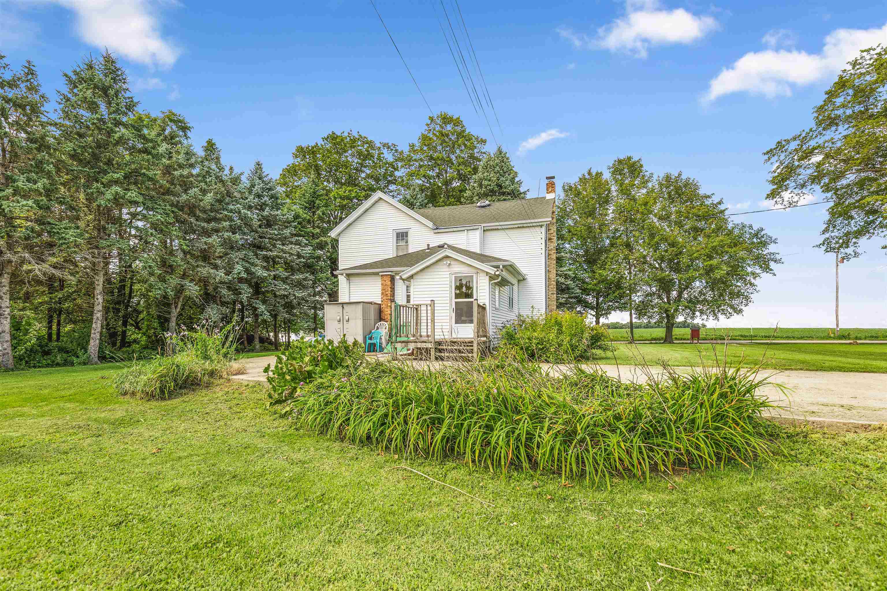9311 State Line Road Capron, IL 61012 - Photo 1 of 51 a view of a house with a yard