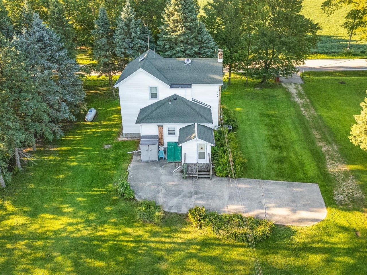 9311 State Line Road Capron, IL 61012 - Photo 14 of 51 a view of a house with a yard