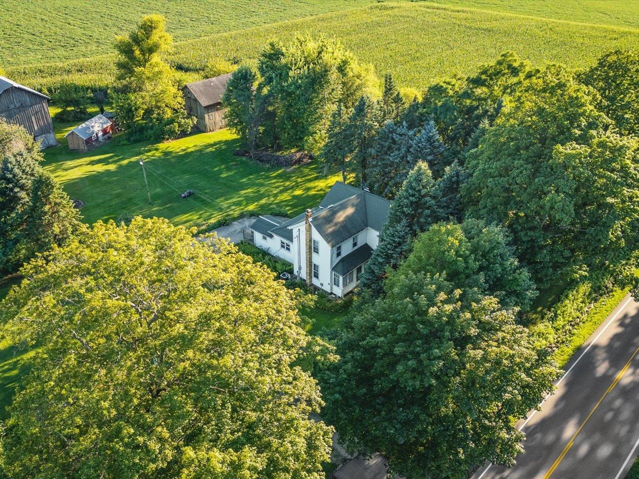 9311 State Line Road Capron, IL 61012 - Photo 21 of 51 an aerial view of a houses with a yard