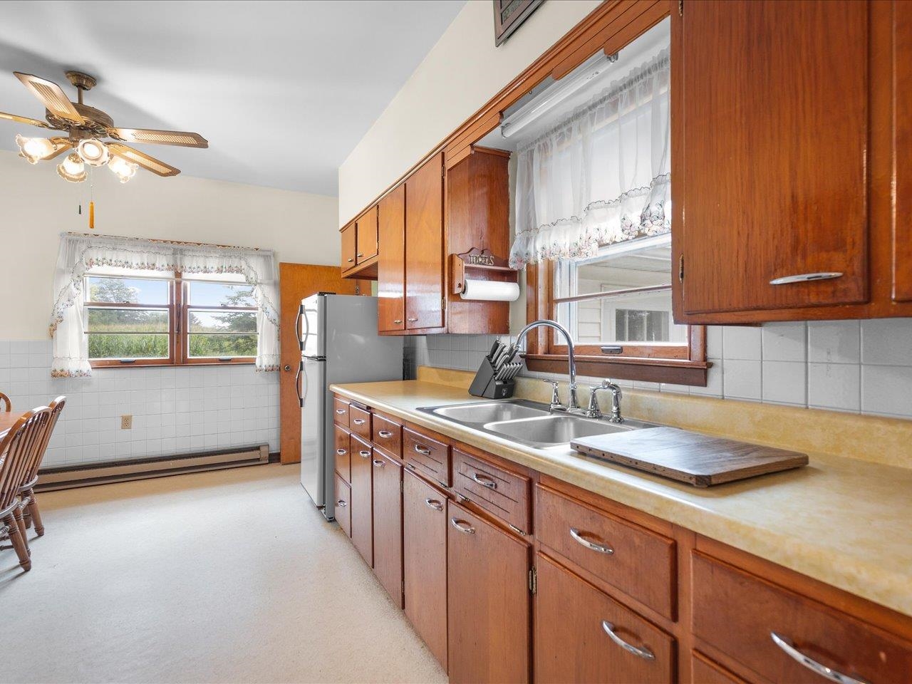 9311 State Line Road Capron, IL 61012 - Photo 29 of 51 a kitchen with a sink and a window