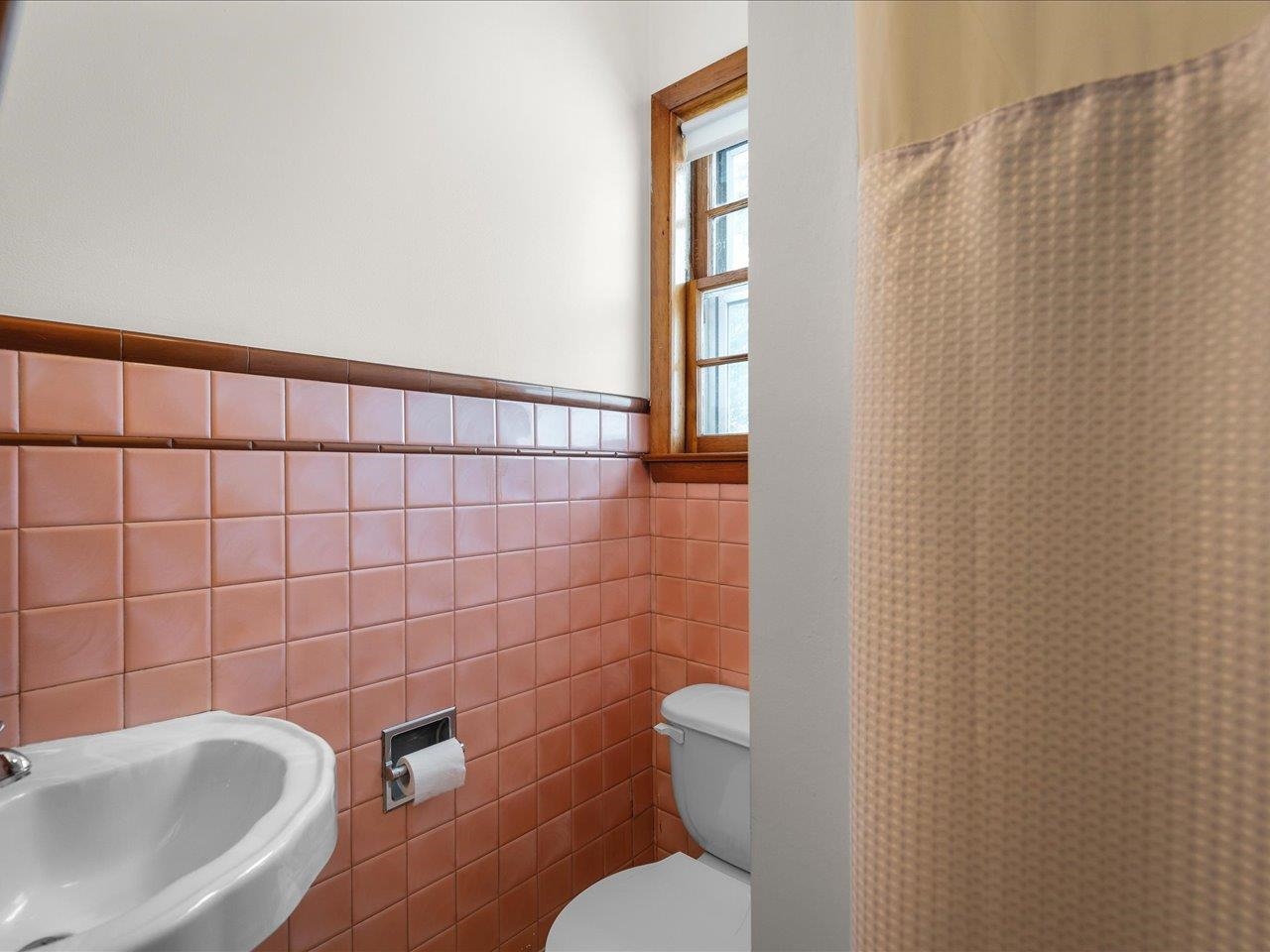9311 State Line Road Capron, IL 61012 - Photo 31 of 51 a bathroom with a toilet a sink and mirror