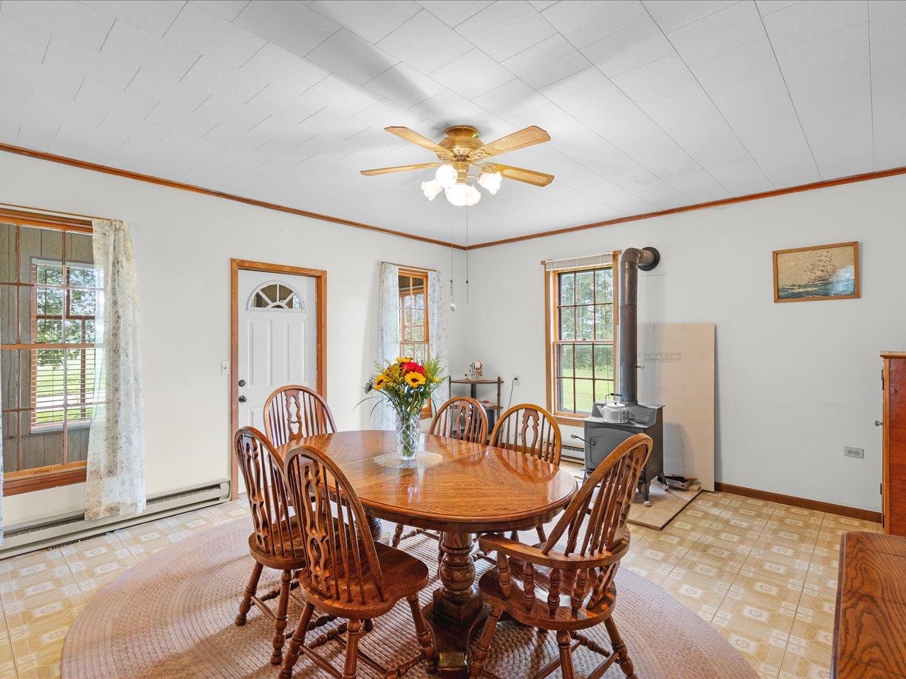 9311 State Line Road Capron, IL 61012 - Photo 35 of 51 a view of a dining room with furniture and window