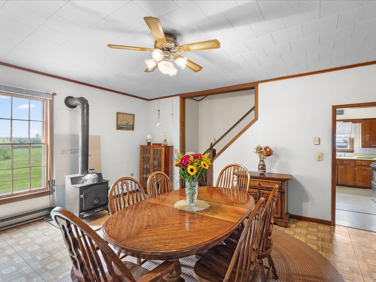 9311 State Line Road Capron, IL 61012 - Photo 36 of 51 a view of a dining room with furniture and window