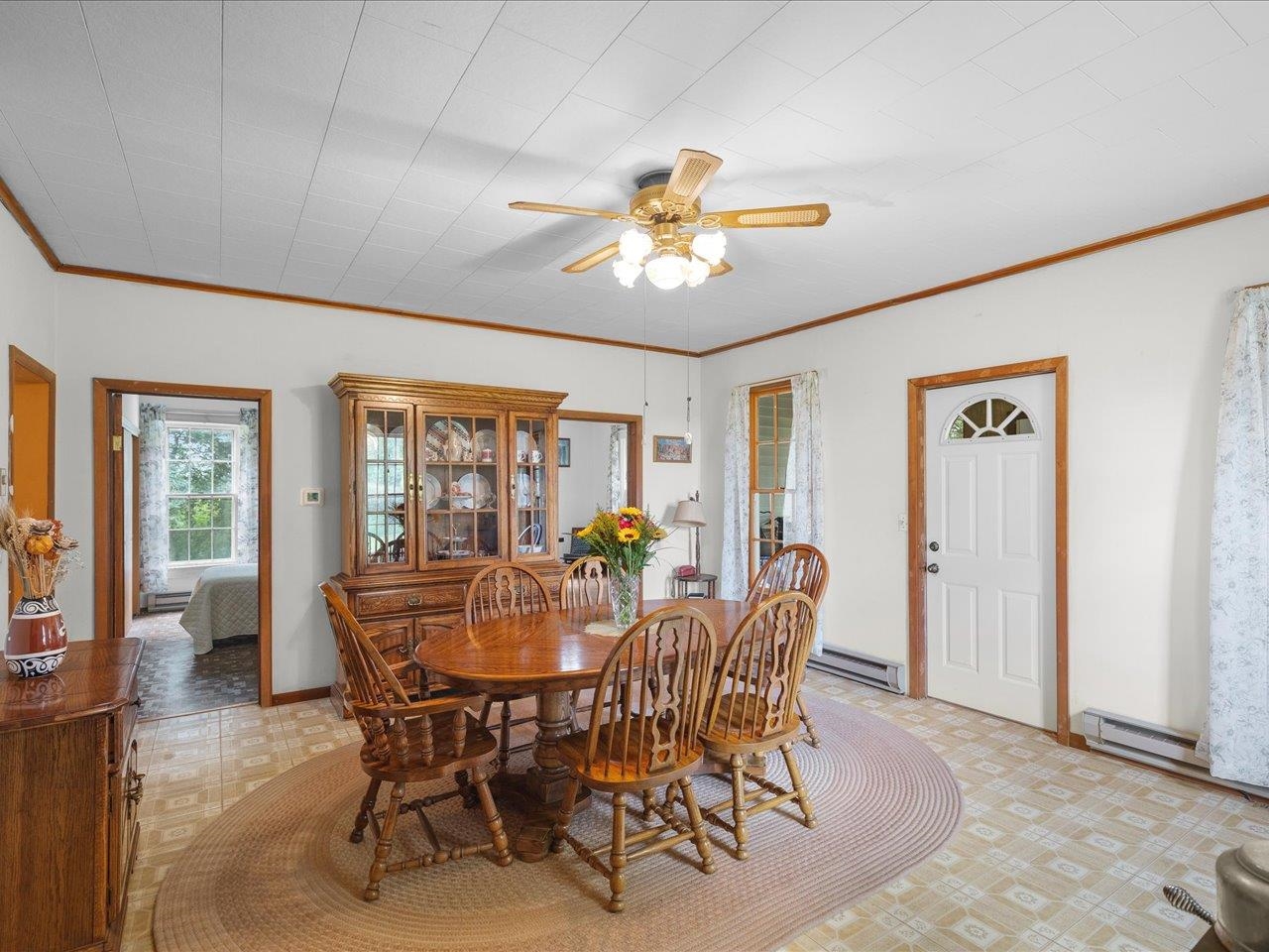 9311 State Line Road Capron, IL 61012 - Photo 38 of 51 a view of a dining room with furniture window and outside view